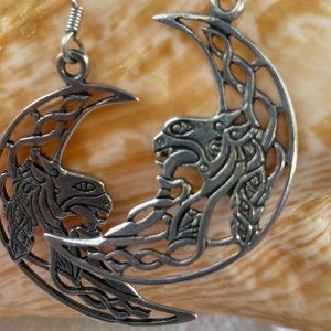 Sterling silver dragons on twisty quarter moon dangle earrings